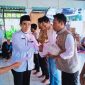 Pegawai dan anggota koperasi di lingkungan Dinas Koperasi dan UKM NTB mengikuti kegiatan IMTAQ Ramadan. Usai pengajian bersama, mereka menerima amplop dan paket sembako sebagai bentuk kebersamaan dan kepedulian di bulan suci.