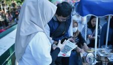 Implementasi QRIS Cross Border yang telah menjangkau lima negara untuk mendukung transaksi internasional di NTB.