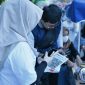 Implementasi QRIS Cross Border yang telah menjangkau lima negara untuk mendukung transaksi internasional di NTB.