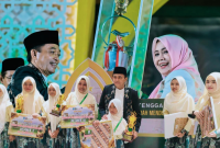 Kafilah Kabupaten Lombok Tengah berpose bersama usai dinobatkan sebagai Juara Umum MTQ XXXI Tingkat Provinsi NTB Tahun 2026 dengan perolehan 13 medali emas, 9 perak, dan 9 perunggu di Lombok Tengah.
