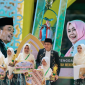 Kafilah Kabupaten Lombok Tengah berpose bersama usai dinobatkan sebagai Juara Umum MTQ XXXI Tingkat Provinsi NTB Tahun 2026 dengan perolehan 13 medali emas, 9 perak, dan 9 perunggu di Lombok Tengah.
