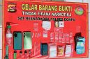 Sejumlah barang bukti yang berhasil diamankan petugas Satresnarkoba Polres Dompu dalam penggerebekan rumah di Desa Calabai, Kecamatan Pekat, Kabupaten Dompu, yang diduga menjadi lokasi peredaran narkotika jenis sabu.
