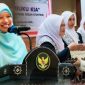 Wakil Bupati Lombok Barat Hj. Nurul Adha bersama Ikatan Bidan Indonesia (IBI) Kabupaten Lombok Barat saat peluncuran Gerakan 1.000 Telur dan Program Pendampingan Bidan dalam rangka memperkuat upaya pencegahan stunting di Aula Kantor Bupati Lombok Barat, Kamis (26/6/2026).