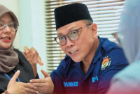 Ketua KPU Provinsi NTB M. Khuwailid bersama tim peneliti BRIN saat kegiatan validasi data dan pengumpulan informasi terkait penguatan kapasitas kelembagaan penyelenggara pemilu di Kantor KPU NTB, Mataram.
