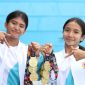 Atlet Akuatik Kota Mataram berfoto bersama usai mendominasi Cabang Olahraga Renang pada Porprov XII NTB 2026 dengan mencetak Delapan Rekor baru dan mengoleksi 13 Medali Emas.