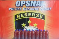 Barang Bukti 24 Botol Besar Miras Jenis Brem Tampa Izin Edar yang Diamankan Polisi di Kota Bima.