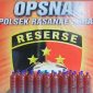 Barang Bukti 24 Botol Besar Miras Jenis Brem Tampa Izin Edar yang Diamankan Polisi di Kota Bima.