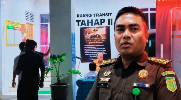 Enam Tersangka Kasus Dugaan Korupsi Pengadaan Masker Covid-19 Menjalani Proses Tahap II setelah Berkas Perkara Dinyatakan P-21 dan Kini Menjadi Tahanan Kota.