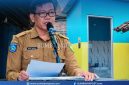 Kepala Dinas Kesehatan Kabupaten Sumbawa H. Syarif Hidayat saat Menyampaikan Kondisi Stunting dan Pentingnya Intervensi Sensitif Lintas Sektor di Kabupaten Sumbawa.