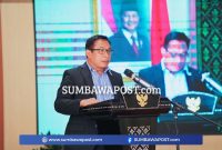 H. Muhamad Aminurlah, SE., Saat Membacakan Laporan Komisi III DPRD NTB Terkait Hasil Evaluasi Kemendagri Terhadap Ranperda Pajak Daerah dan Retribusi Daerah.