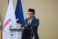 Akhdiansyah, SHI, Saat Membacakan Laporan Komisi III DPRD NTB Dalam Rapat Paripurna Terkait Konversi BPR NTB Menjadi BPRS NTB Bangkit Bersama.