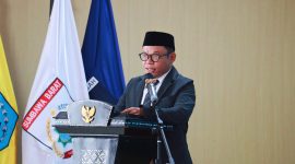 Akhdiansyah, SHI, Saat Membacakan Laporan Komisi III DPRD NTB Dalam Rapat Paripurna Terkait Konversi BPR NTB Menjadi BPRS NTB Bangkit Bersama.
